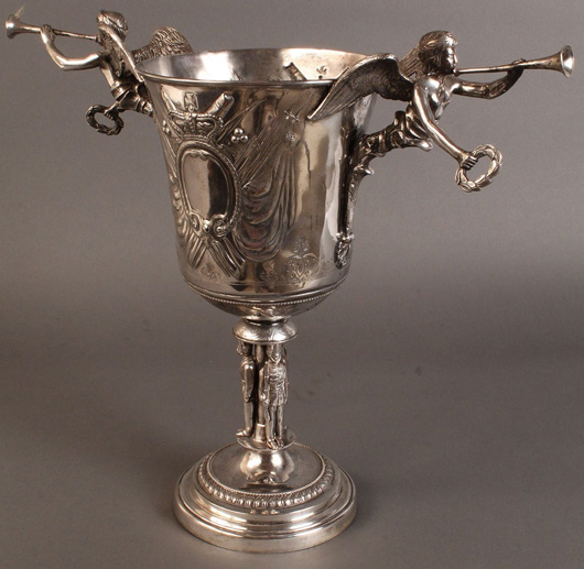 A silver-plated trophy with military theme and figural soldier pedestal. Estimate: $800-$1,200. Image courtesy of Case Antiques.